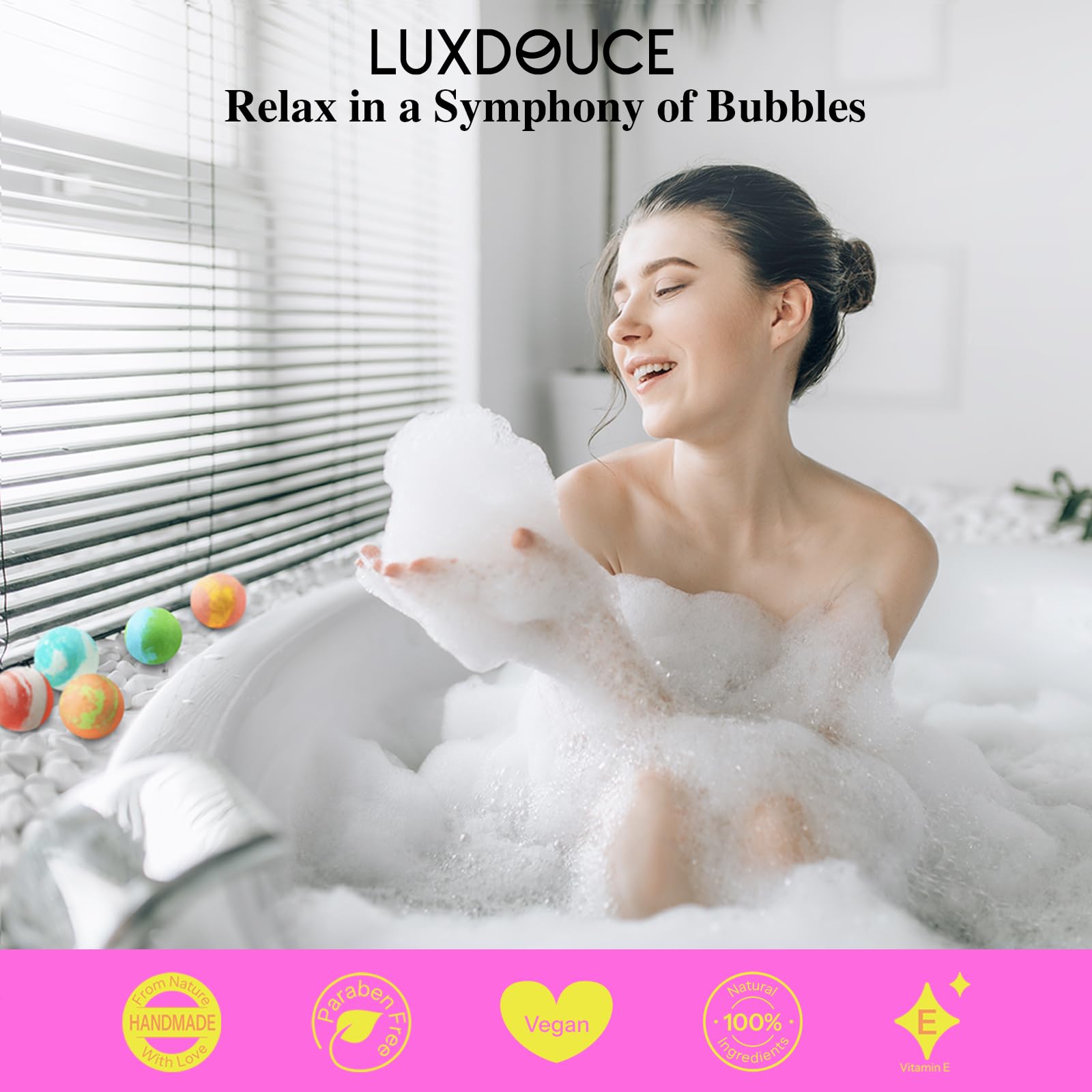 LUXDOUCE hand holding one bath bomb showing size and easy single-use benefit