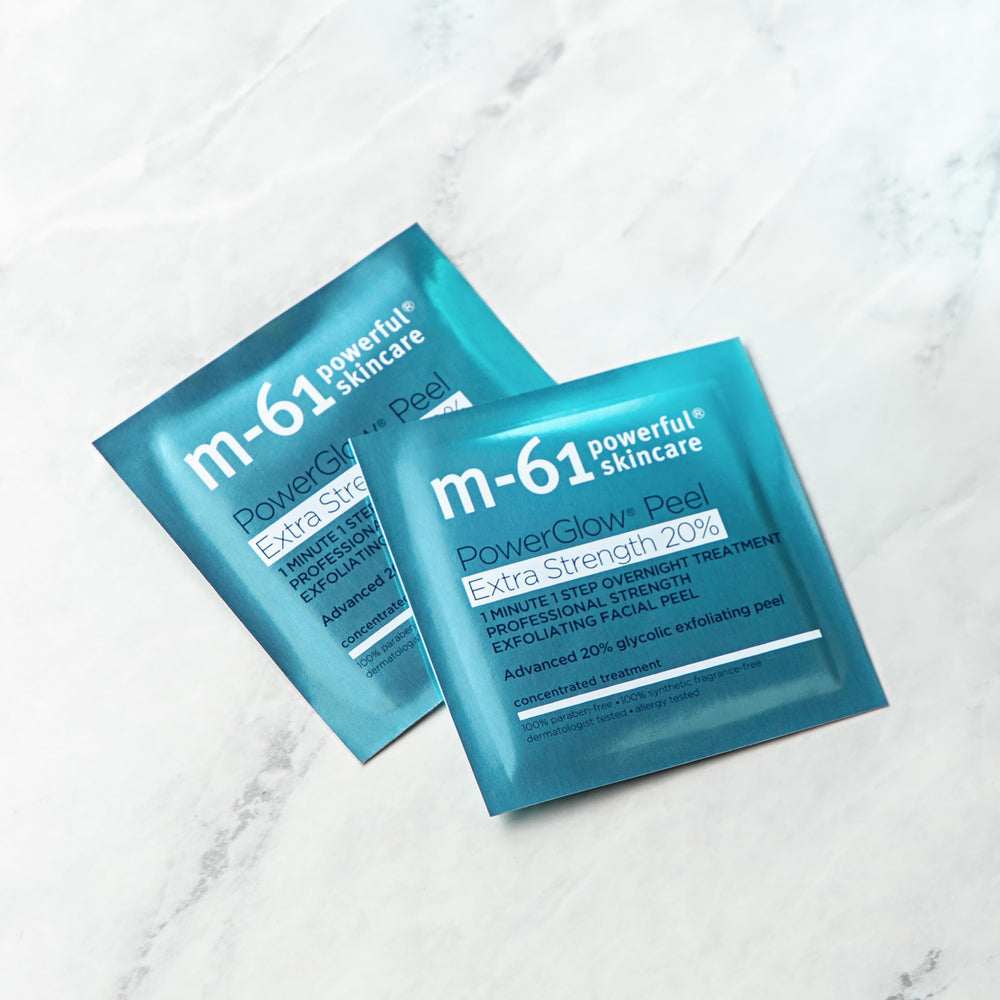 m-61 dispenser open with pads highlighting convenient storage