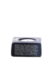 MAC Carbon pan next to a coin for scale showing compact size and travel-friendly benefit