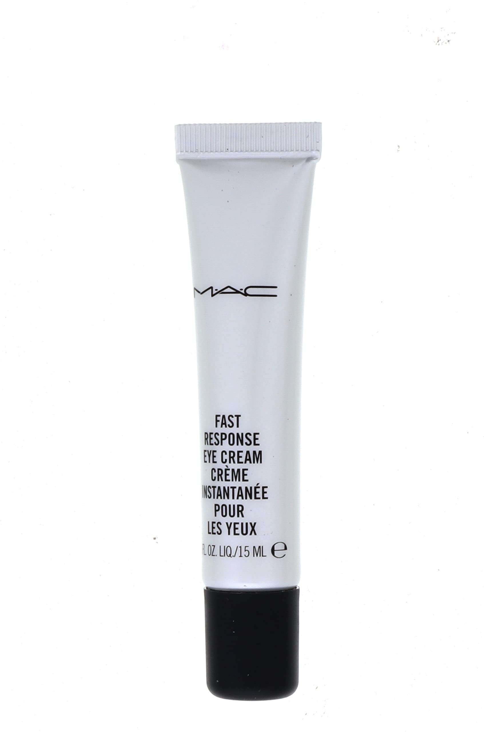 MAC application demo patting cream under eye to reduce puffiness and brighten