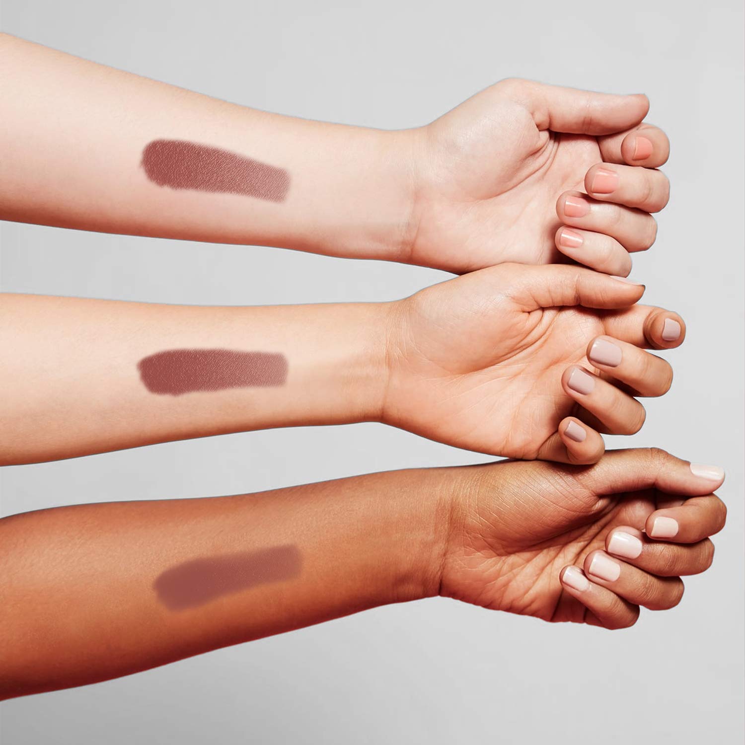 MAC Honeylove arm swatch displaying nude-rosy shade for accurate color reference