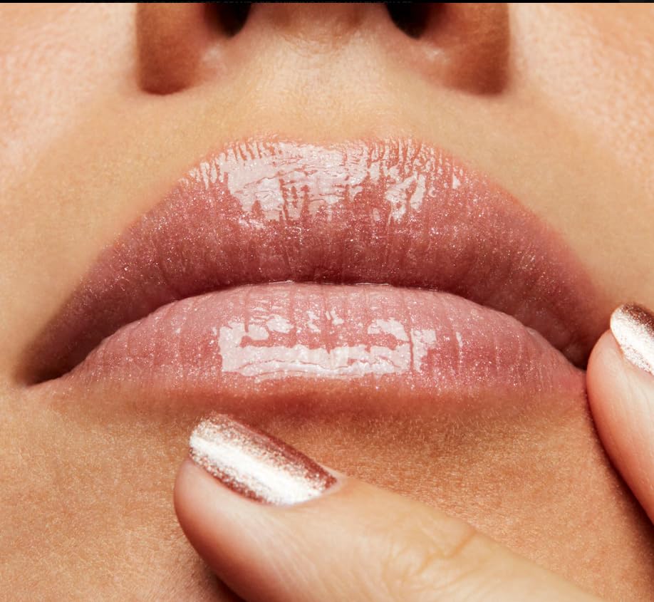 MAC Lipglass worn on lips in lifestyle setting for luminous shine
