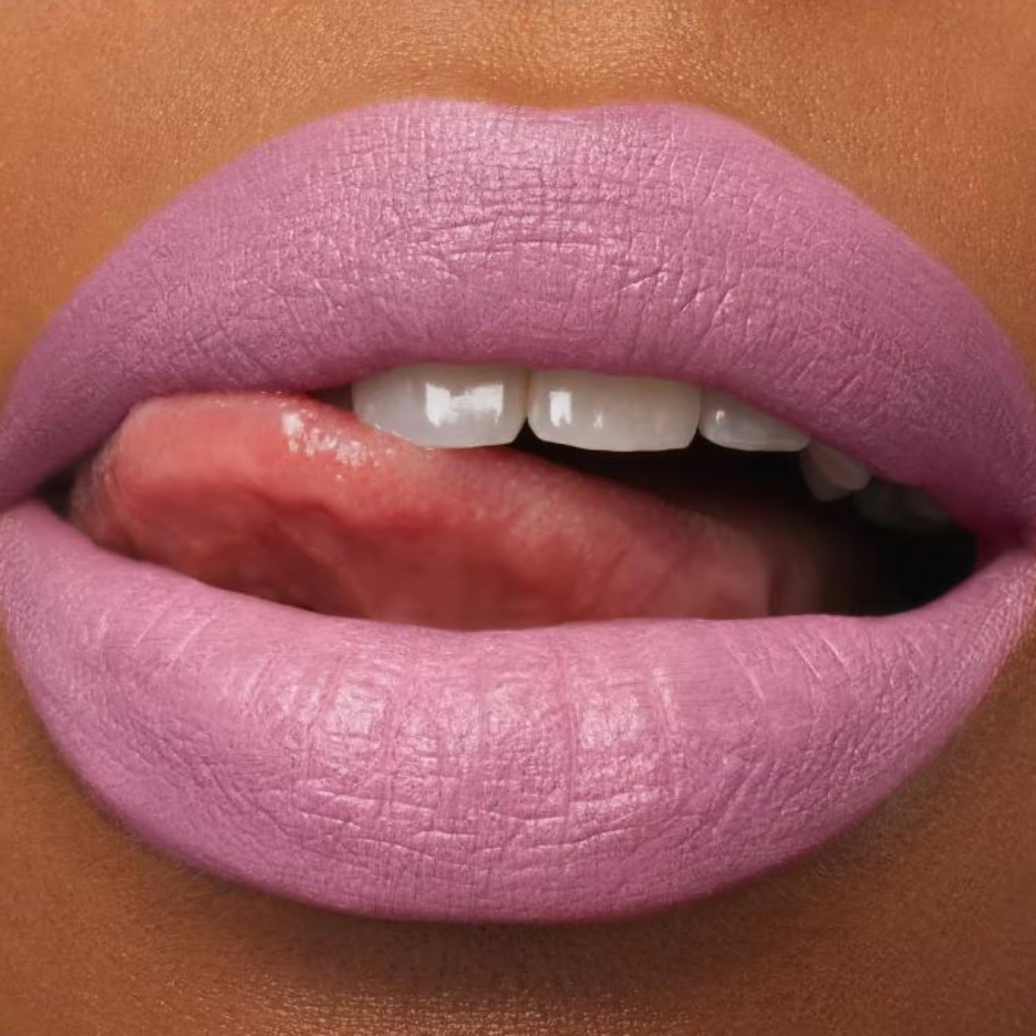 MAC lipstick in use on model demonstrating smooth coverage and hydrated matte look for everyday wear
