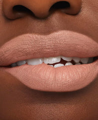 MAC Macximal Honeylove texture swatch on arm showing rich pigment and smooth finish