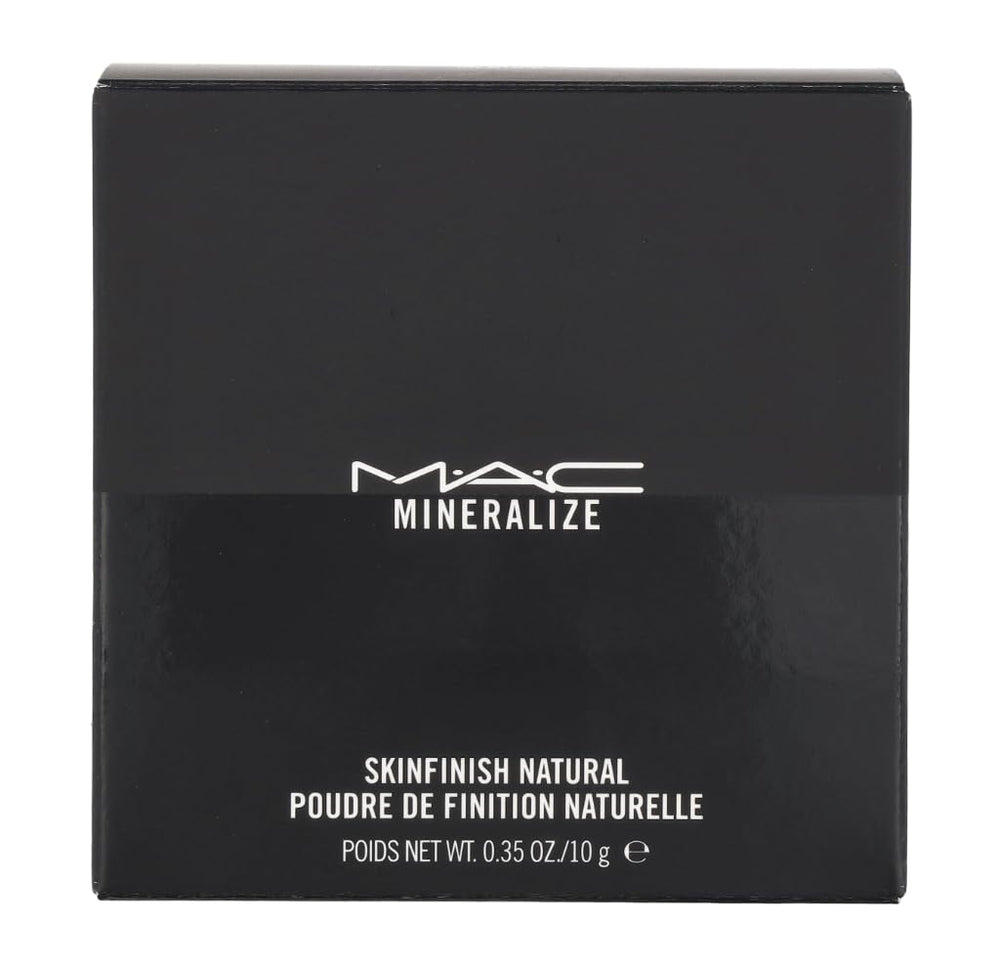 MAC powder being picked up with brush showing seamless blending advantage