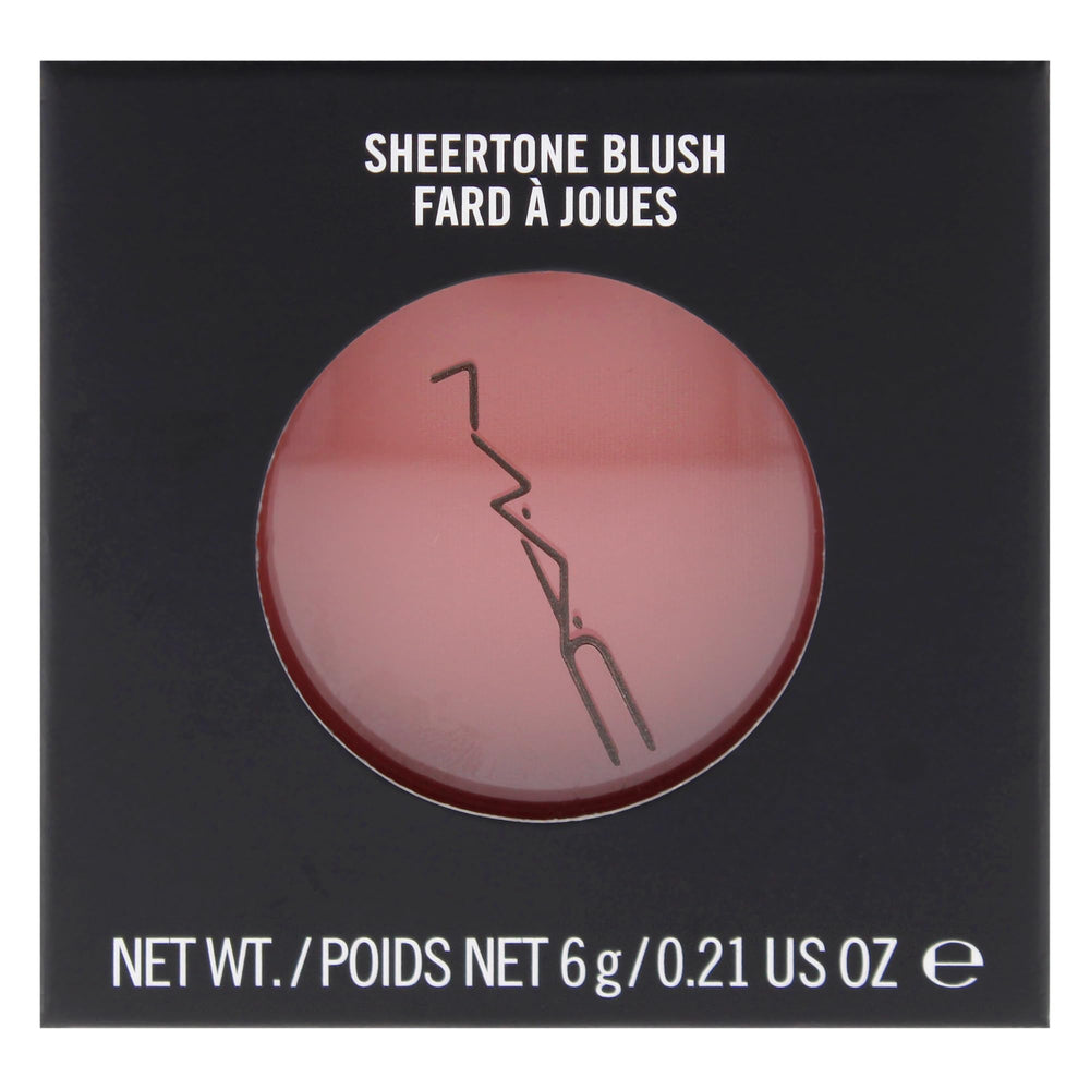 MAC Sheertone Blush on model cheeks illustrating beige-pink warmth and lift