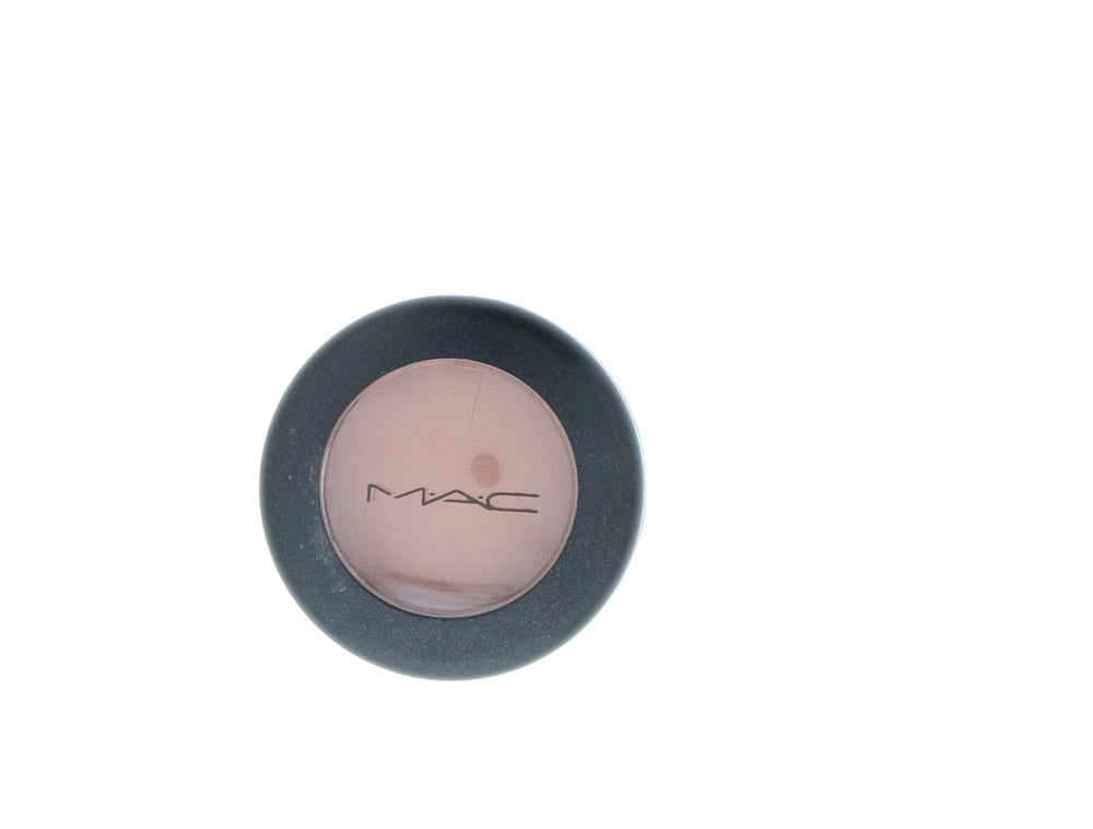 MAC Soft Brown on brush ready to apply for even, controlled pigment