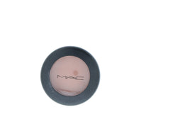 MAC Soft Brown on brush ready to apply for even, controlled pigment