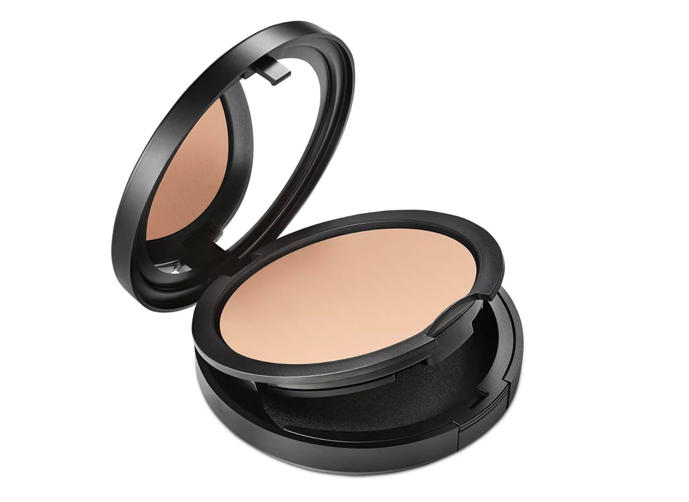 MAC Studio Fix powder surface close-up showing smooth texture and blendability