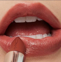 MAC Ximal applied on lips in lifestyle shot showing wearable pink-brown color benefit