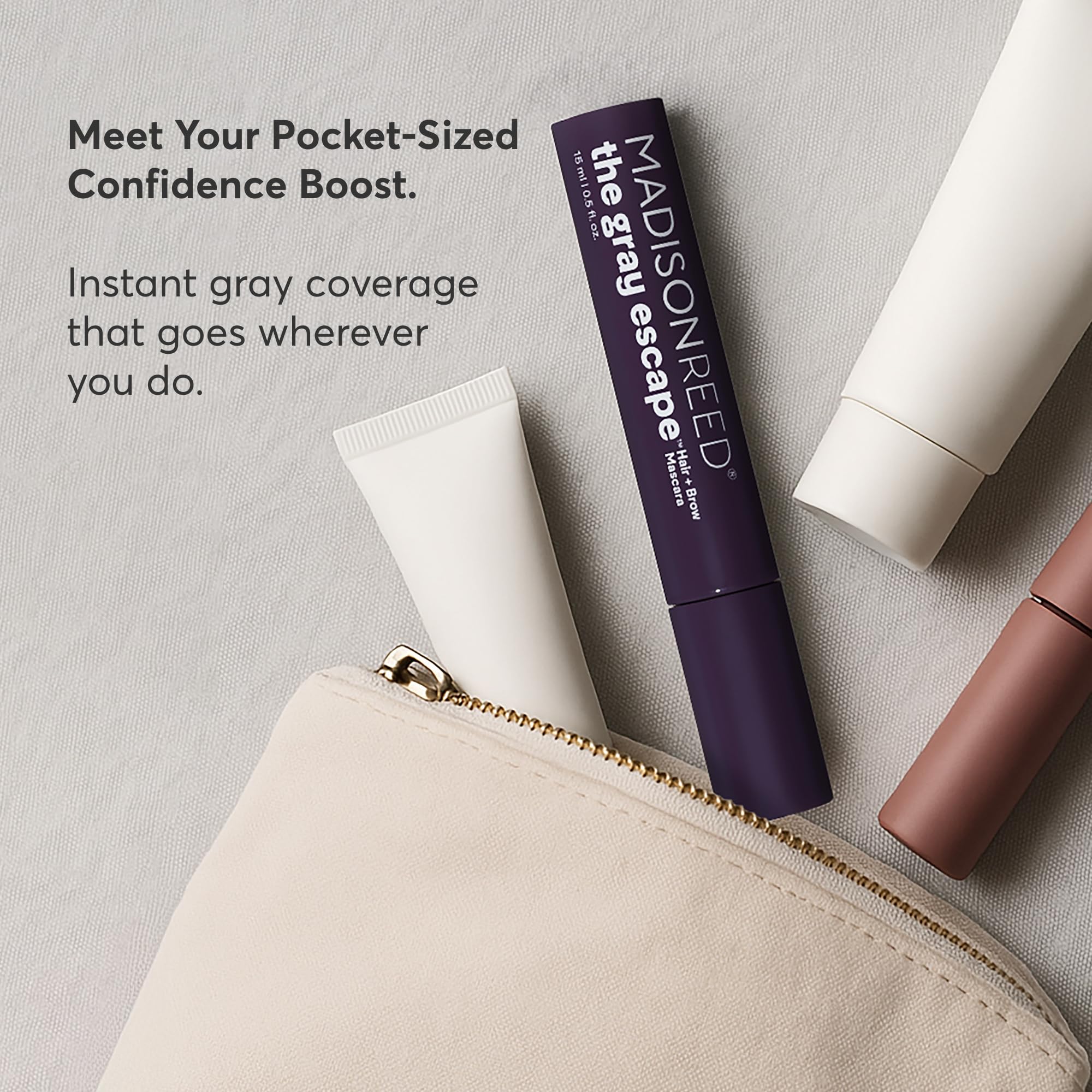 Madison Reed tube held in hand for size comparison showing travel-ready convenience benefit