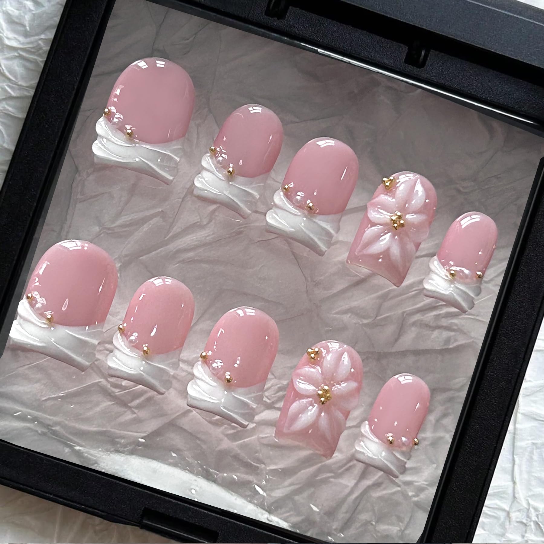 MAGLFELL front view of 10-piece box showing short square French tips for quick salon looks