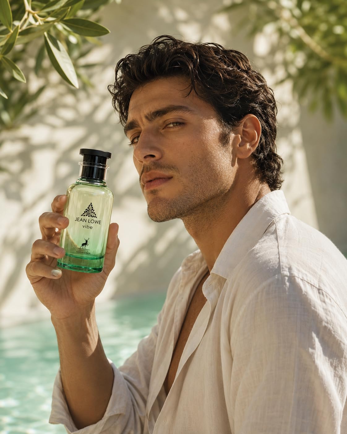 Maison Alhambra perfume droplet on skin showing smooth texture and longevity