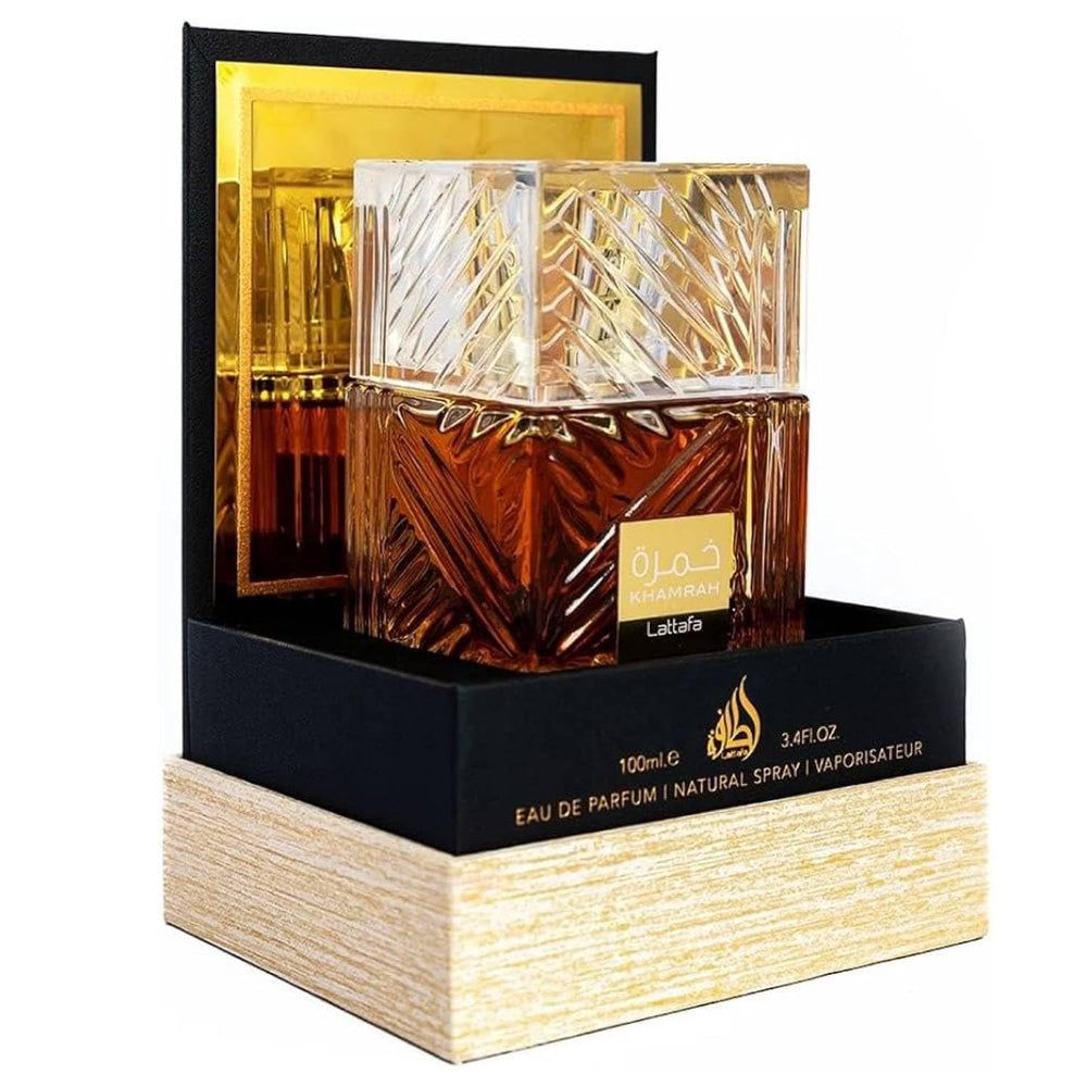 Maison Alhambra perfume styled in evening setting conveying cozy, sophisticated ambiance