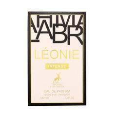 Maison Alhambra Leonie Intense held in hand showing size and travel-friendly 100ml benefit