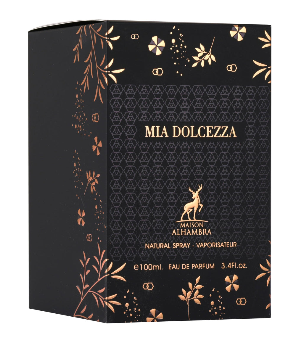 Maison Alhambra bottle beside gift box illustrating size and ready-to-give presentation