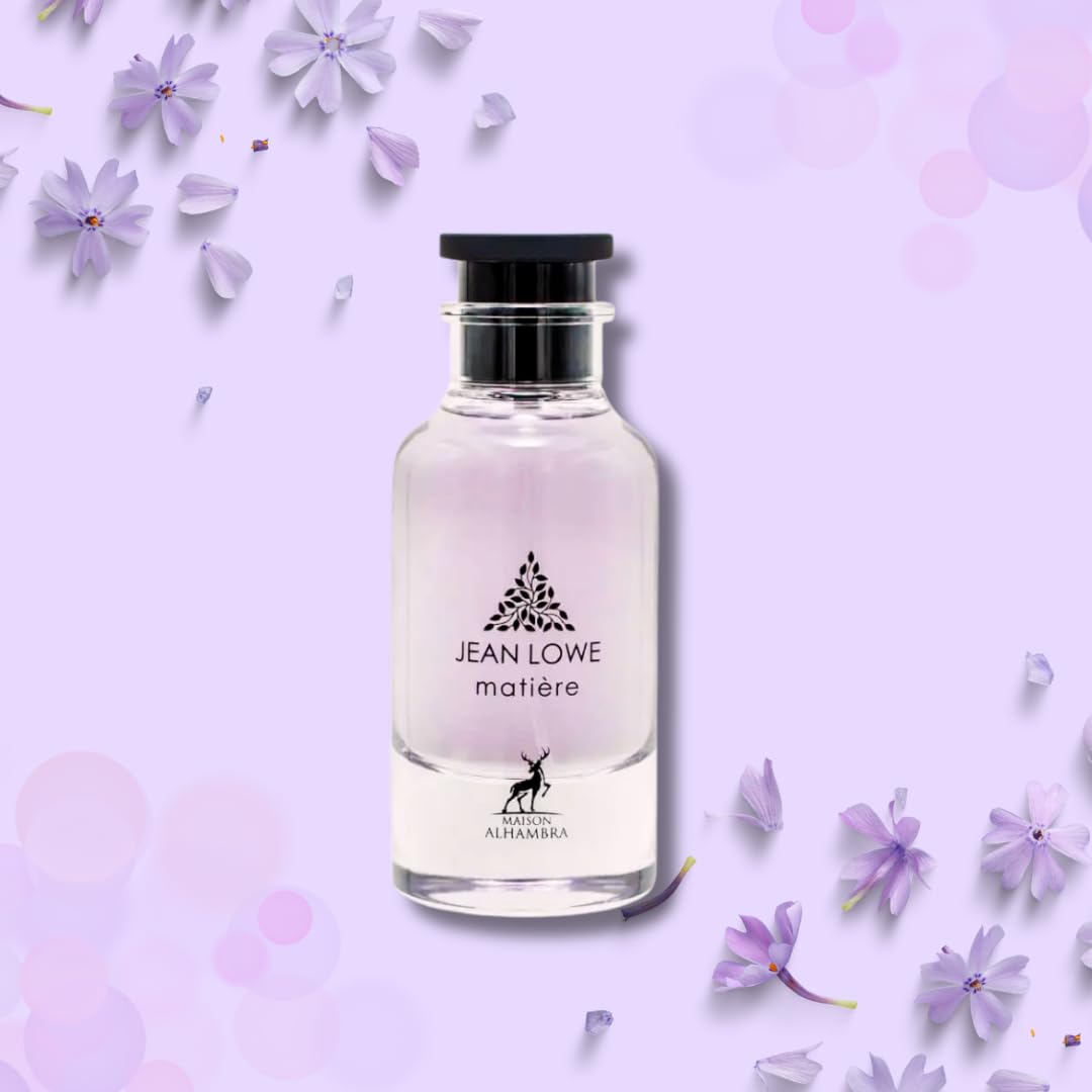 Maison Alhambra bottle held in hand showing 3.4 ounce scale and gift-ready size