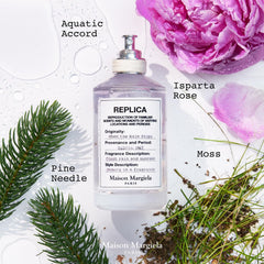 Maison Margiela spray in action releasing fine mist to illustrate application benefit