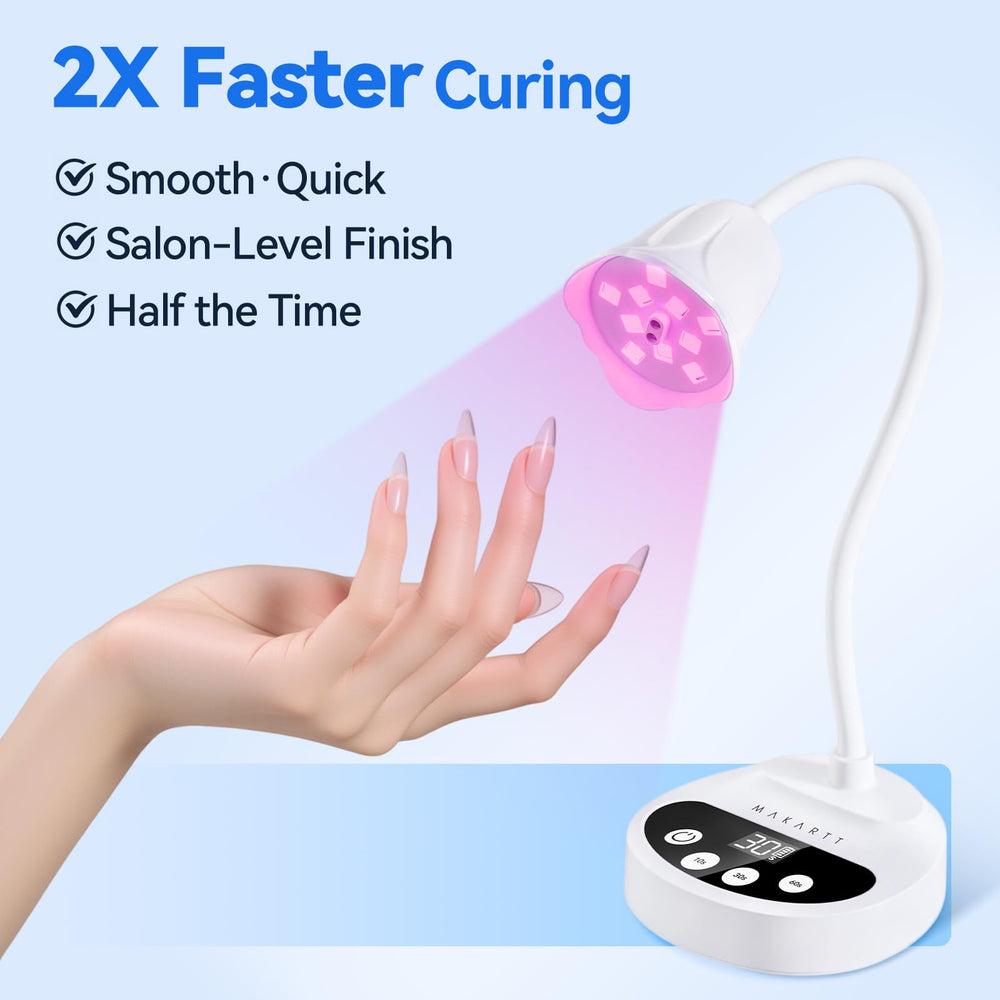 Makartt lamp held next to hand showing compact travel‑friendly size benefit