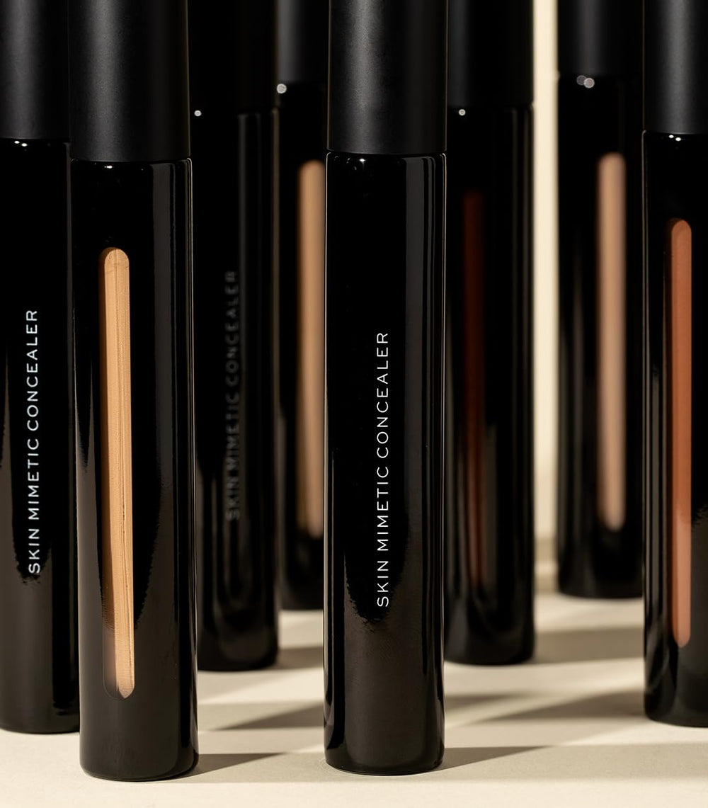 MAKE concealer in makeup bag with mirror for everyday touch-ups on the go