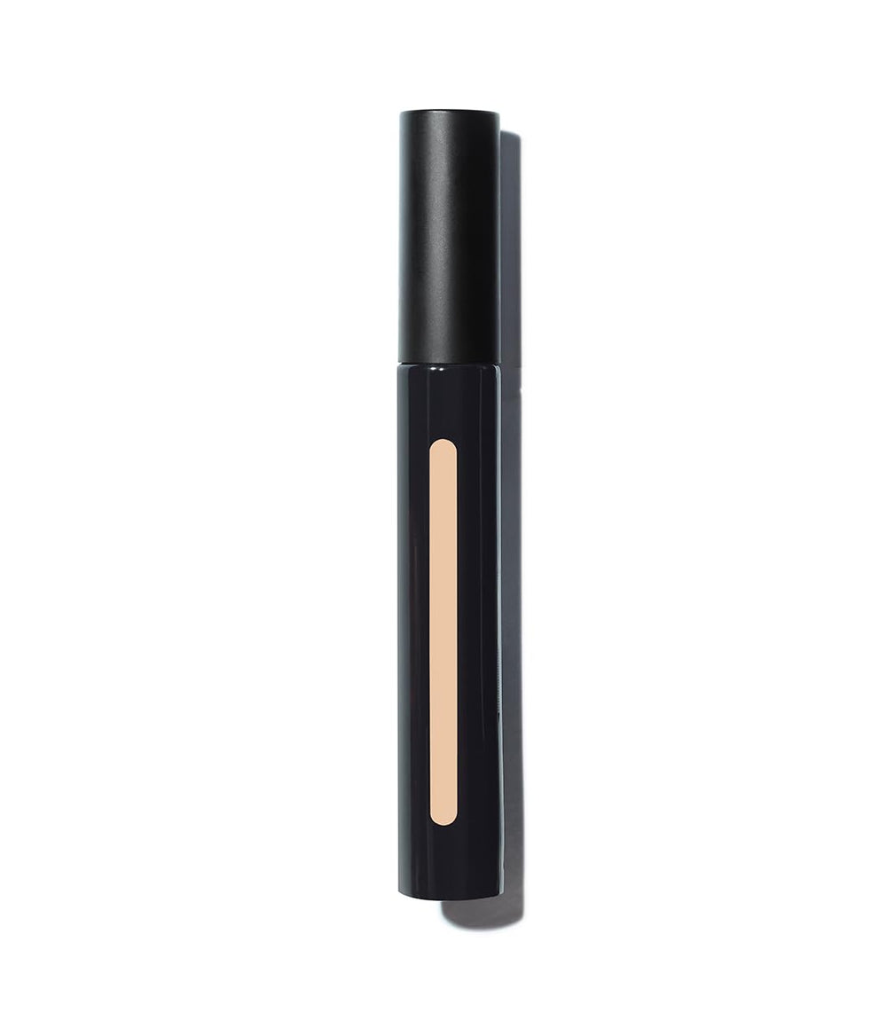 MAKE concealer applied under eye demonstrating brightening effect