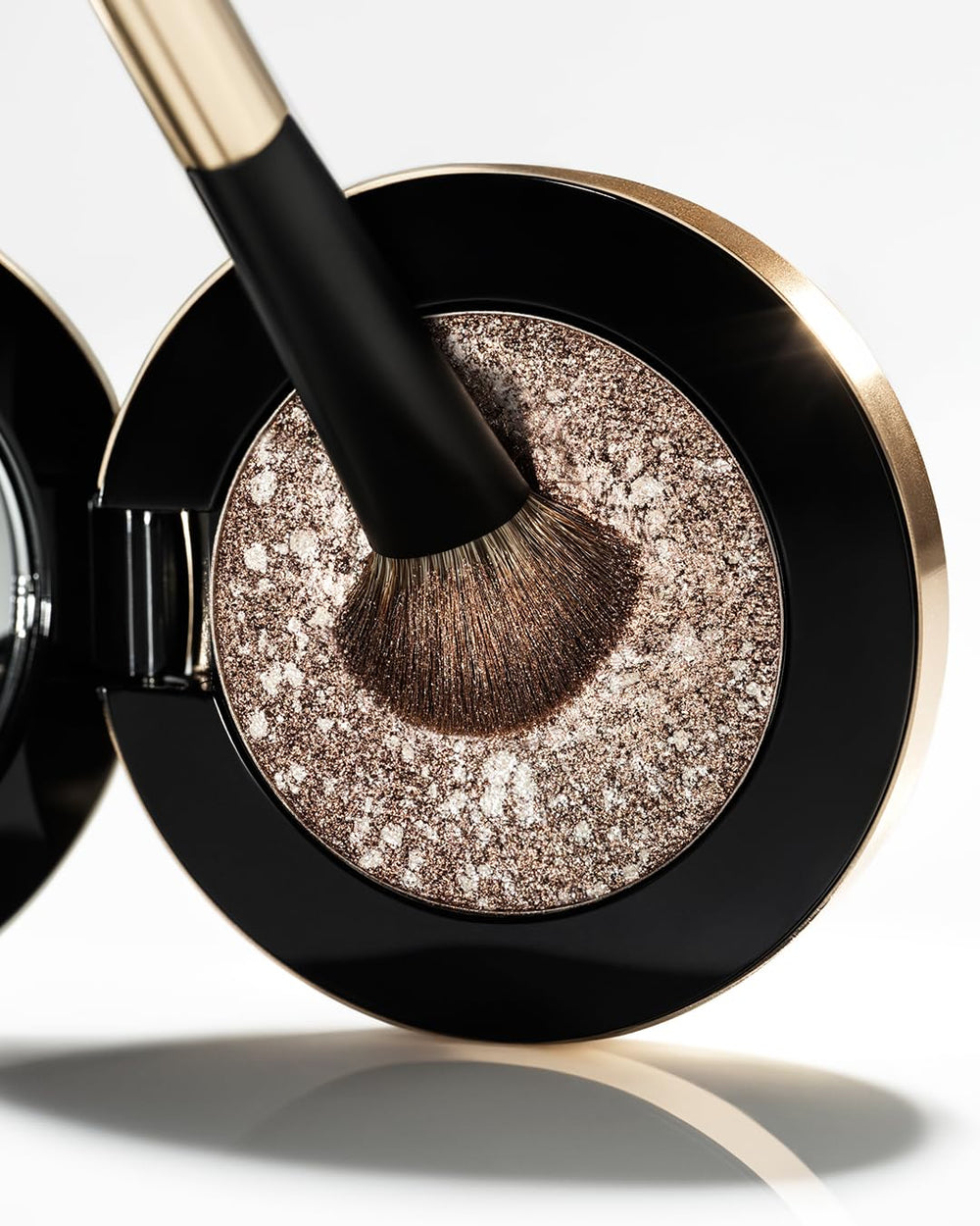 MAKE Quartz lid swatch in natural light showing multi-chrome shift