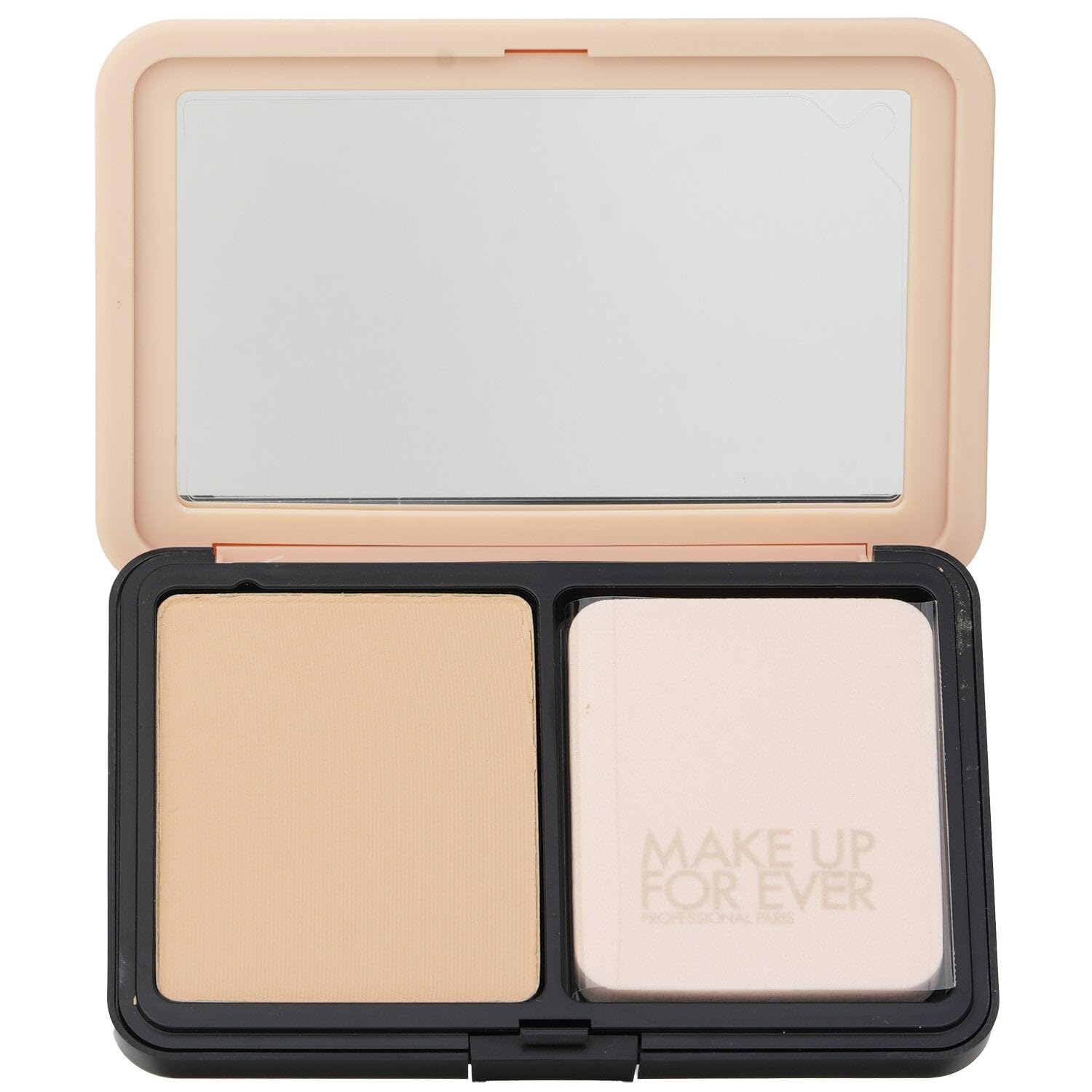 Make Up For Ever applying powder with a brush for even, natural coverage