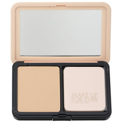 Make Up For Ever applying powder with a brush for even, natural coverage