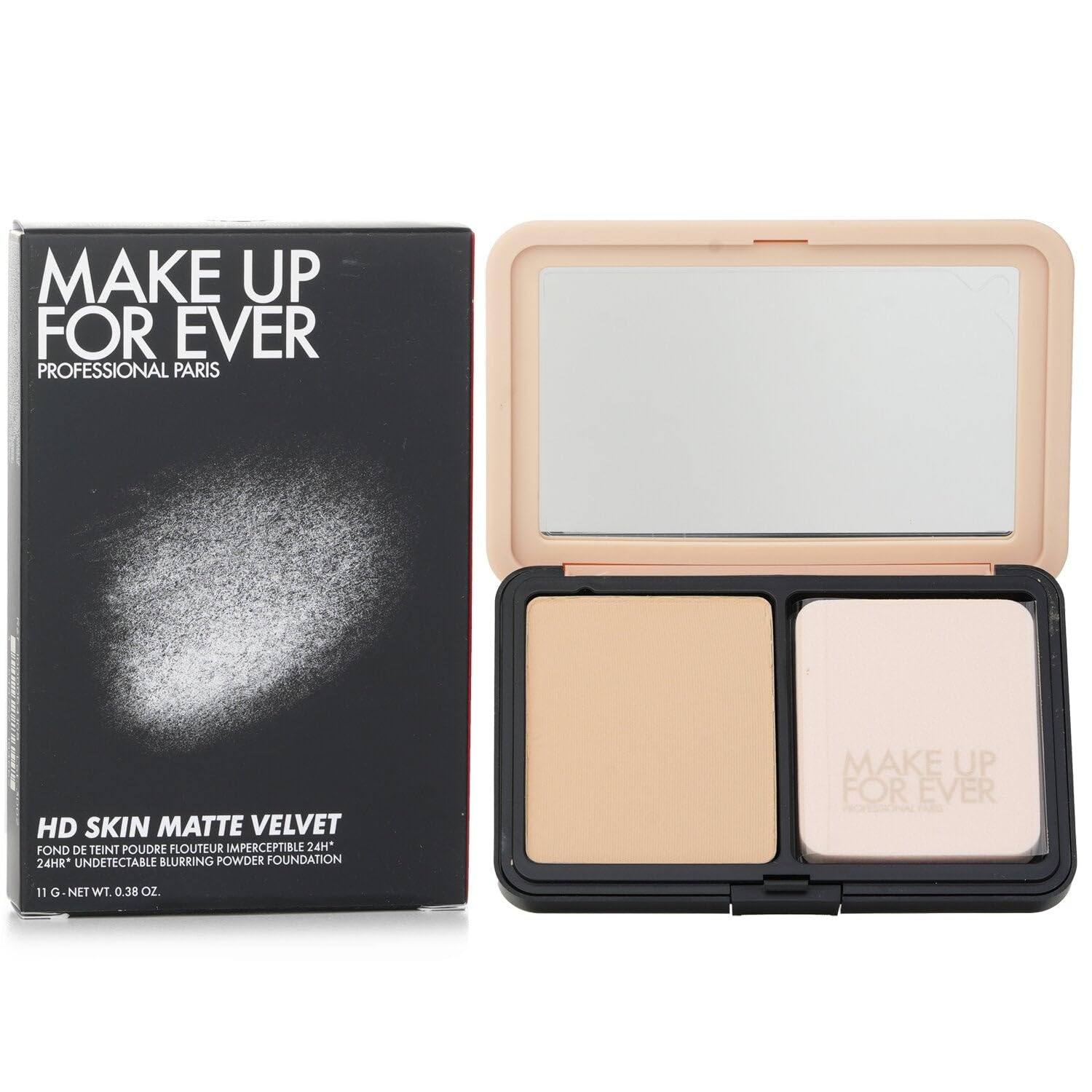 Make Up For Ever compact in hand showing scale and portable size benefit
