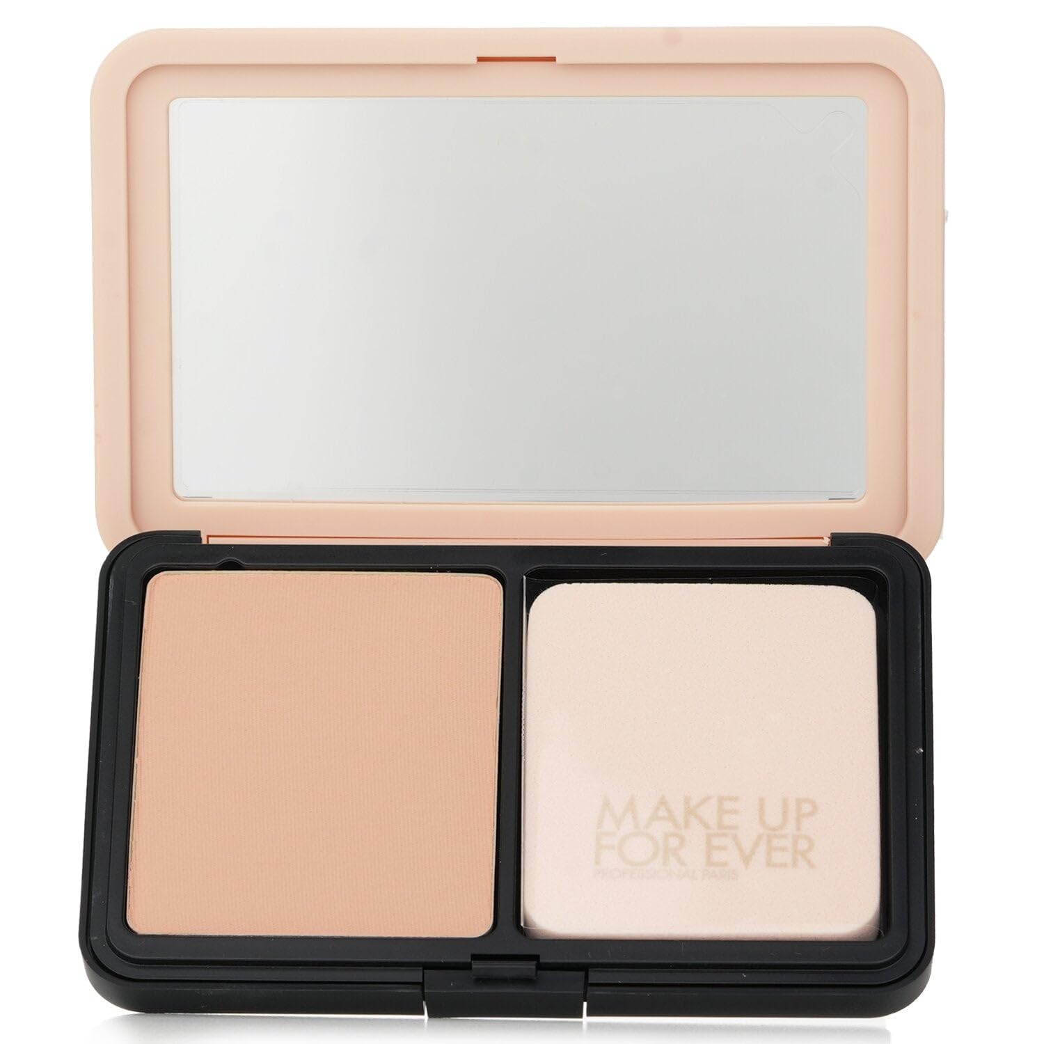 Make Up For Ever lifestyle shot of compact used outdoors for shine control