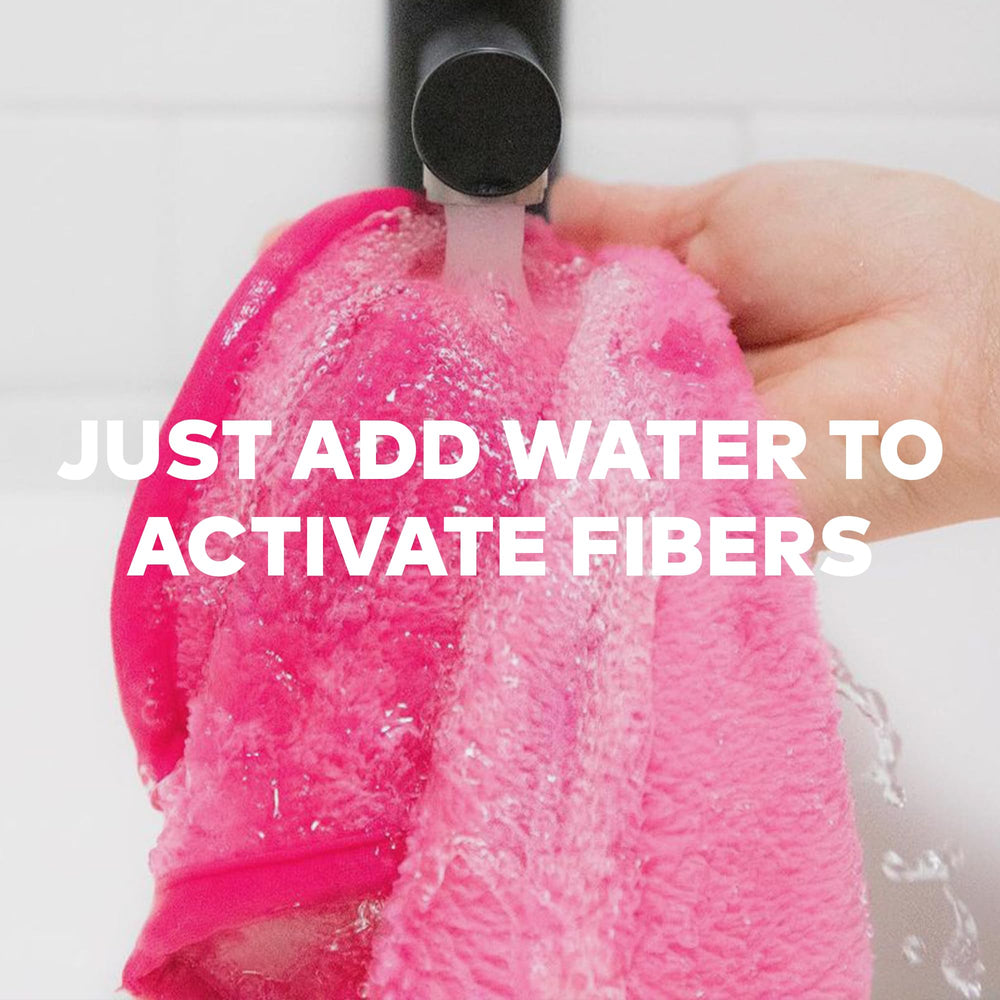 MakeUp Eraser in hand wet with water removing waterproof mascara easily