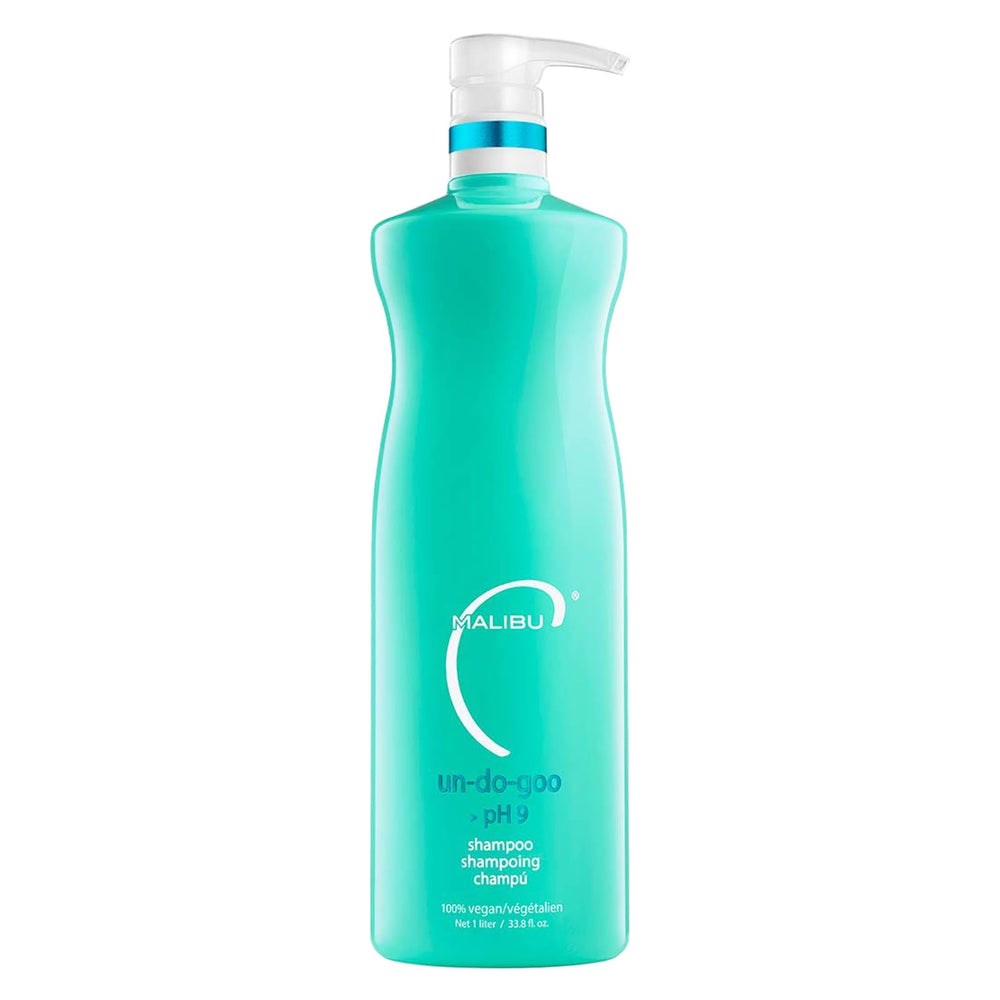 Malibu C bottle held in hand showing 33.8 oz scale for value