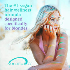 Malibu C purple shampoo bottle dispensing pigment to neutralize brass