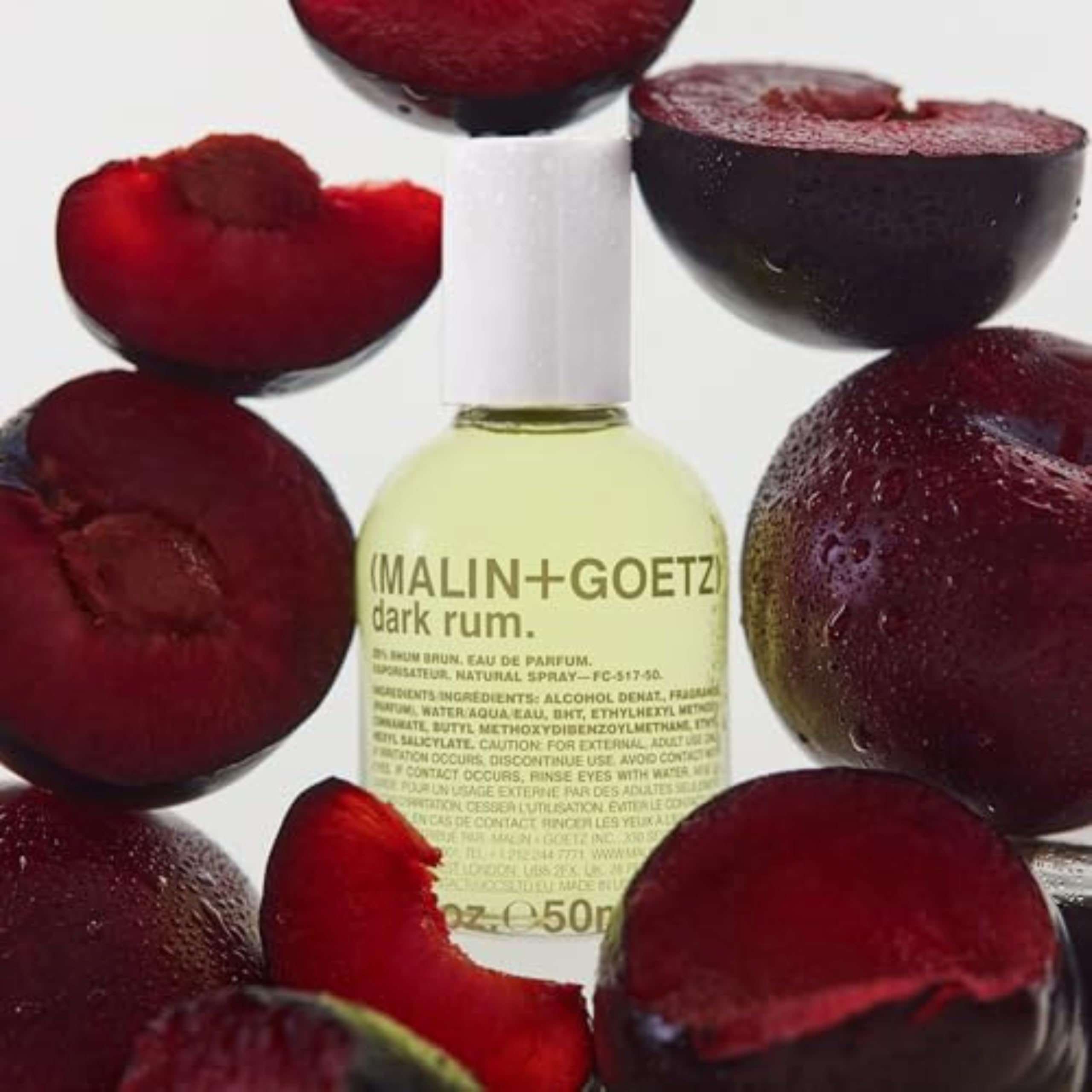 MALIN+GOETZ lifestyle image of bottle on evening table suggesting refined wear