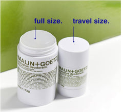 MALIN+GOETZ deodorant with cap open showing 1 fl oz scale for travel compliance