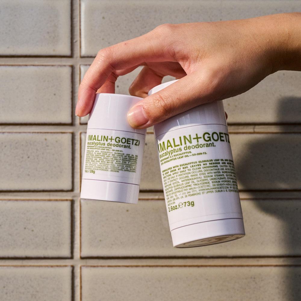 MALIN+GOETZ deodorant package back showing product facts and origin benefit