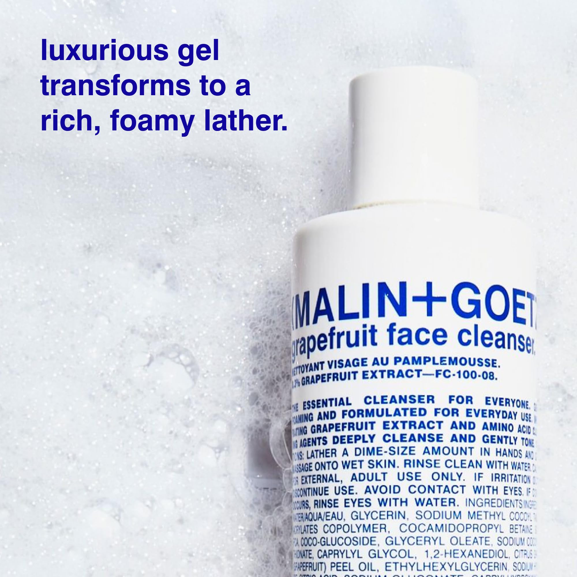 Close-up of MALIN+GOETZ label highlighting product name and gentle formula benefits