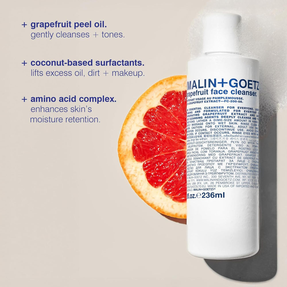 Hand dispensing MALIN+GOETZ cleanser from pump for easy, mess-free application