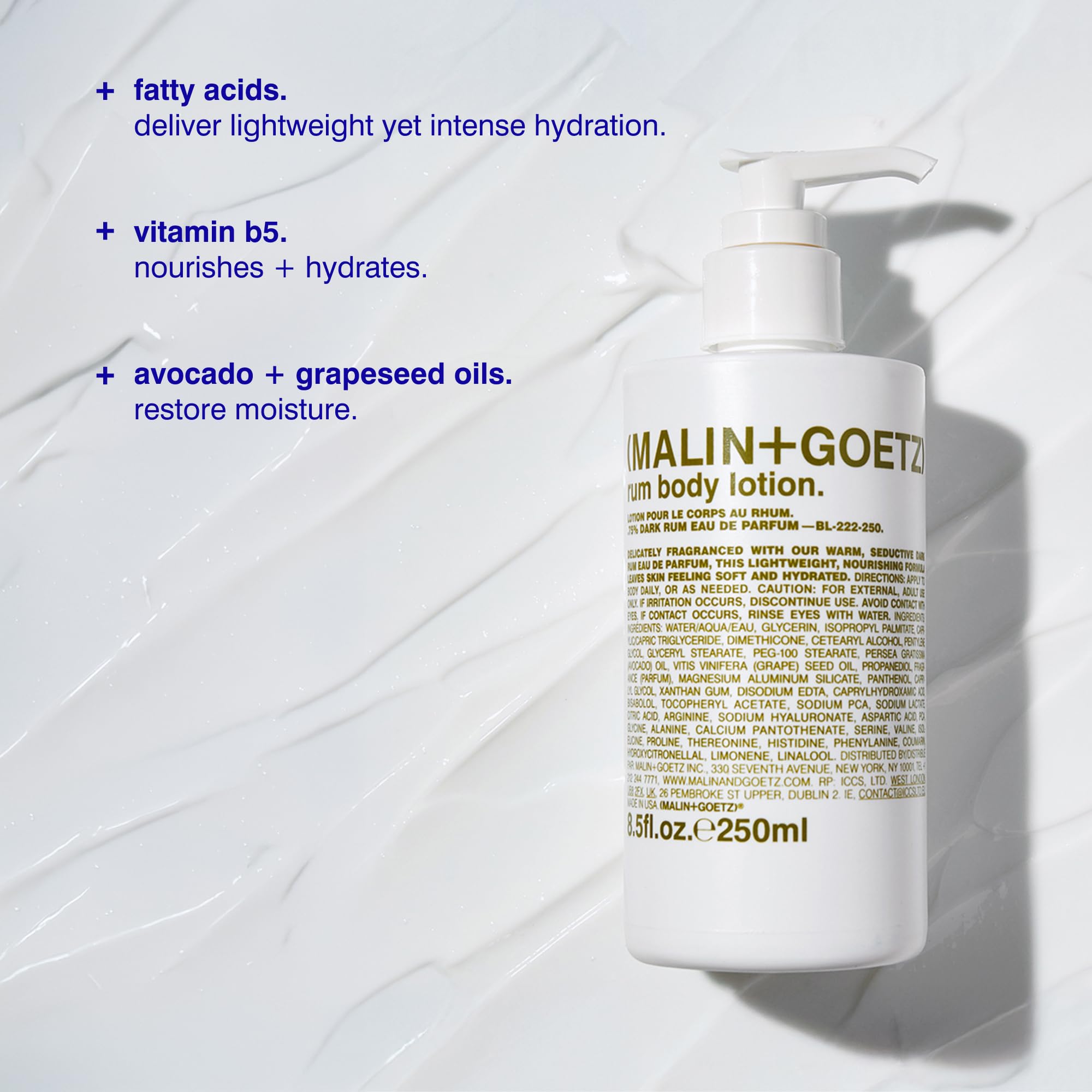 MALIN+GOETZ drop of lotion on fingertip showing smooth, non-greasy finish