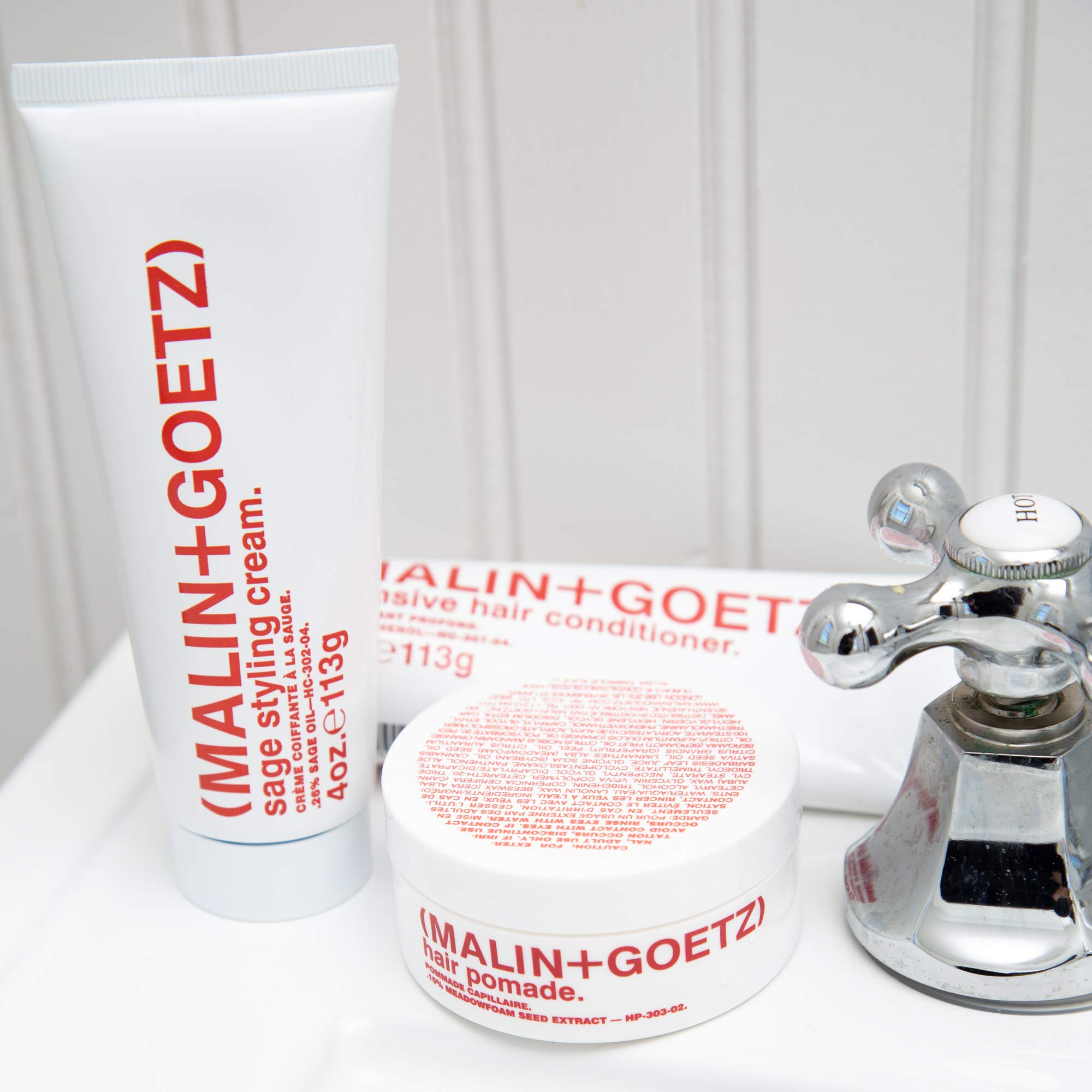 MALIN+GOETZ on bathroom vanity in lifestyle scene for everyday styling routine