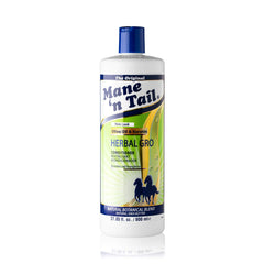 Mane 'n Tail bottles in hand to show 27.05oz size and scale