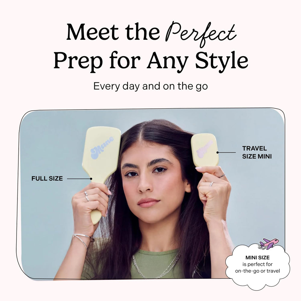 Mane mini brush in hand to show scale and travel-ready convenience