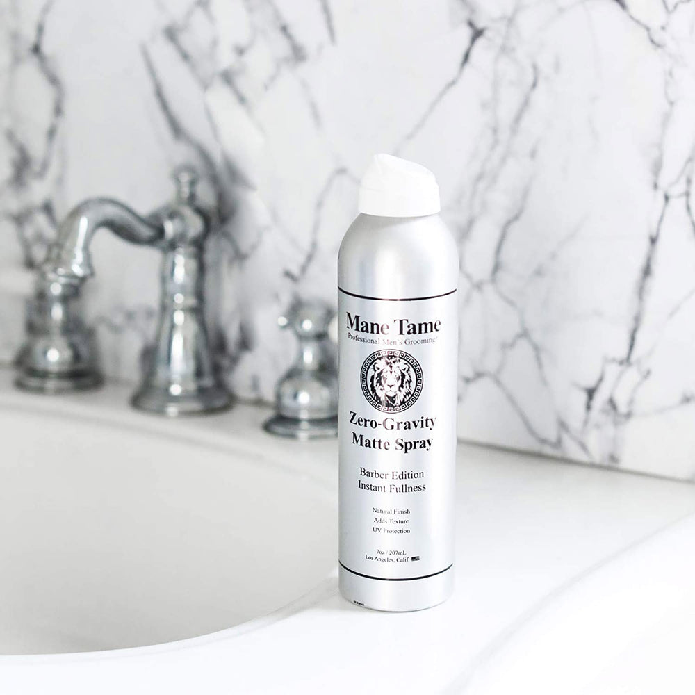 Mane Tame spray misting through hair to create instant texture and volume