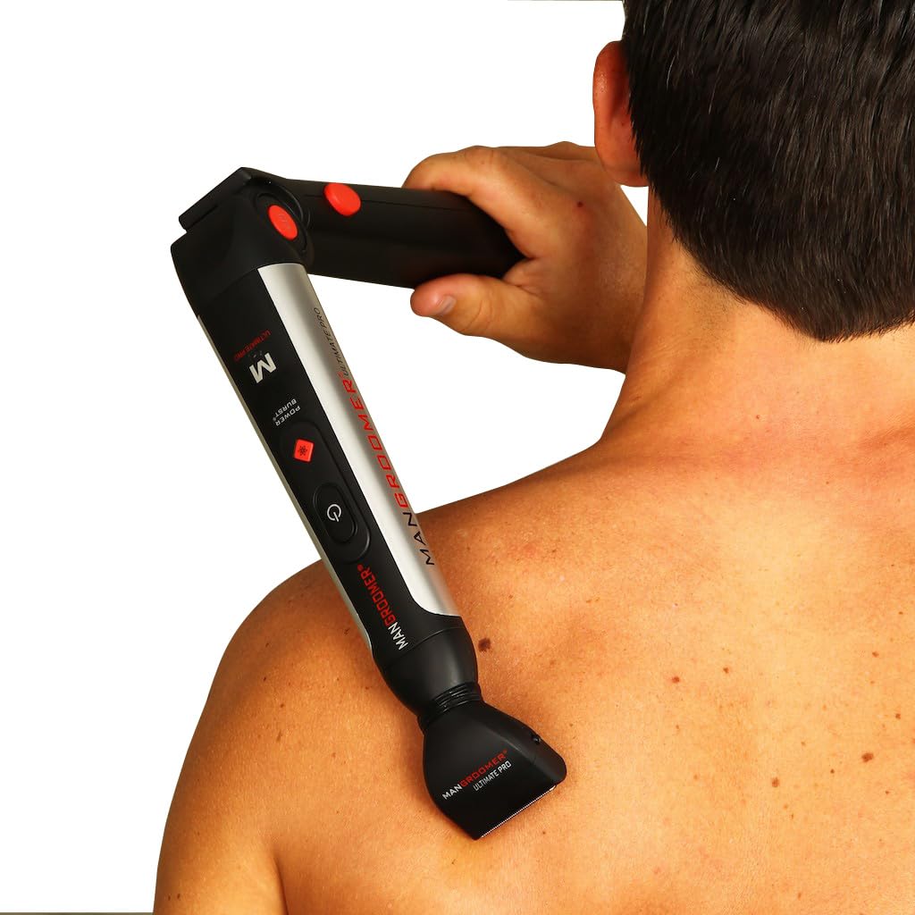 MANGROOMER attachment held in hand for scale showing compact portability