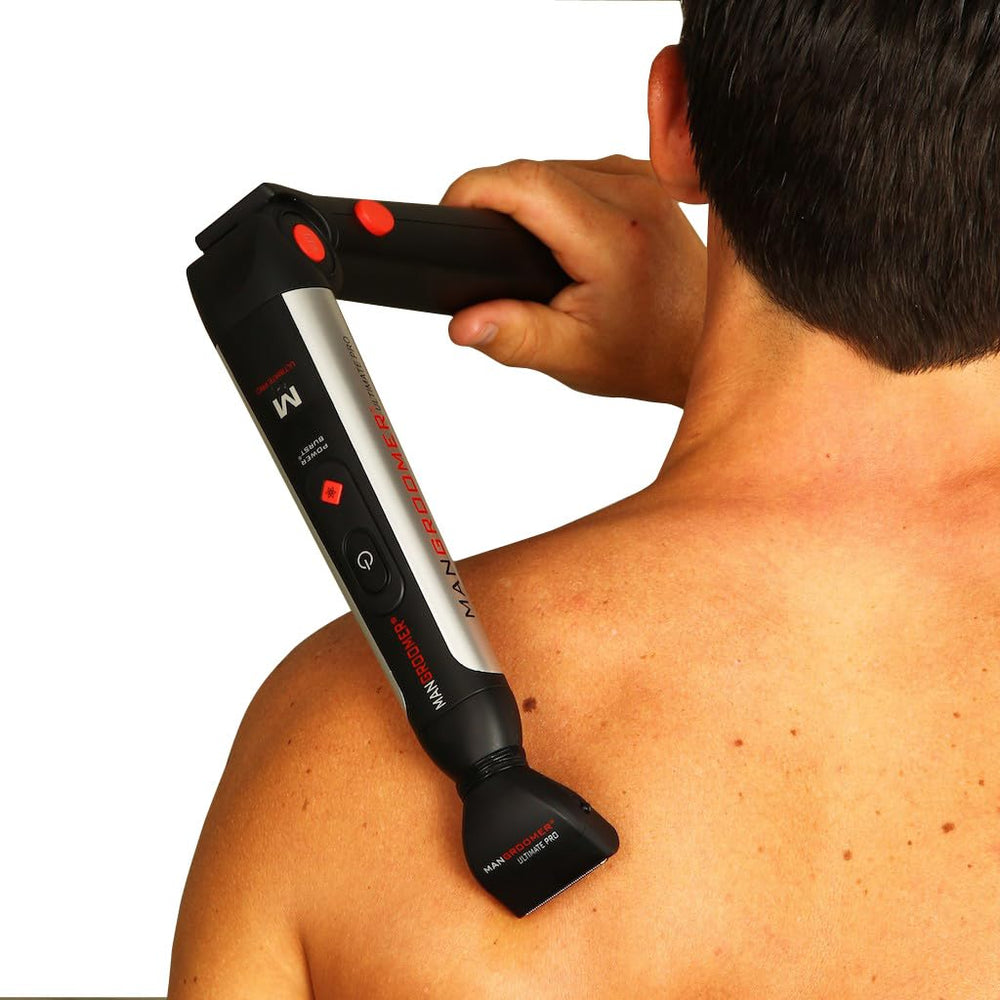 MANGROOMER attachment held in hand for scale showing compact portability
