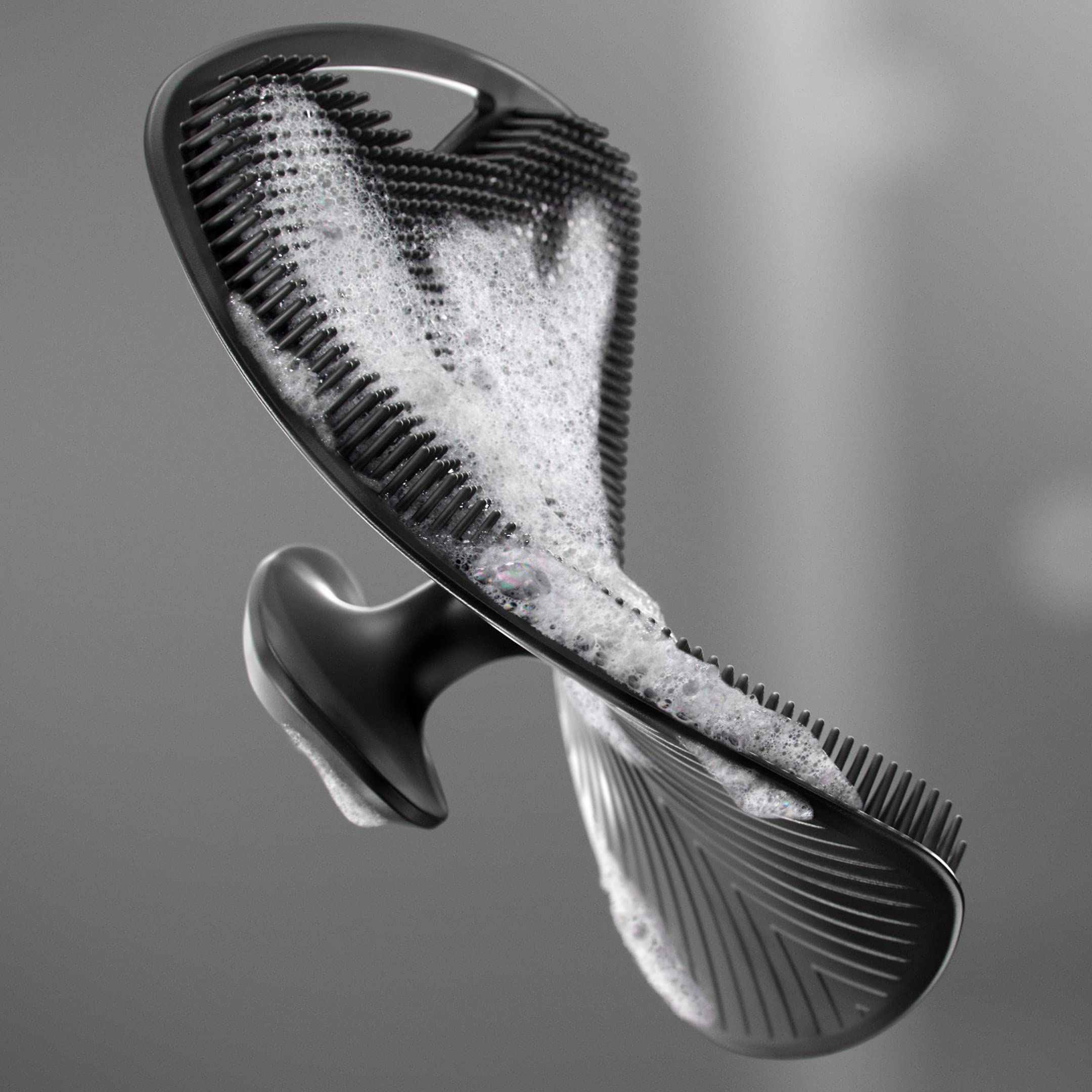 MANSCAPED buffer being rinsed and drained showing easy-to-clean and hygienic benefit