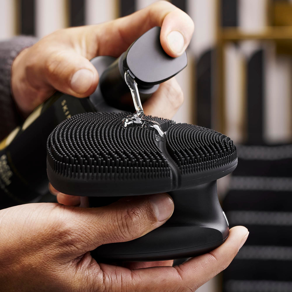 MANSCAPED Face Buffer PRO travel lock button detail emphasizing secure transportation