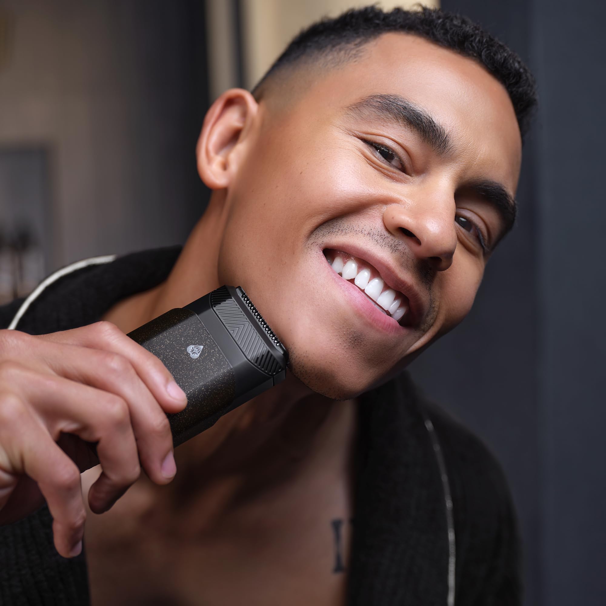 MANSCAPED Handyman held in hand to show pocket-size portability and convenience