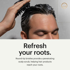 MANSCAPED Scalp Buffer in shower being used to remove buildup and lather