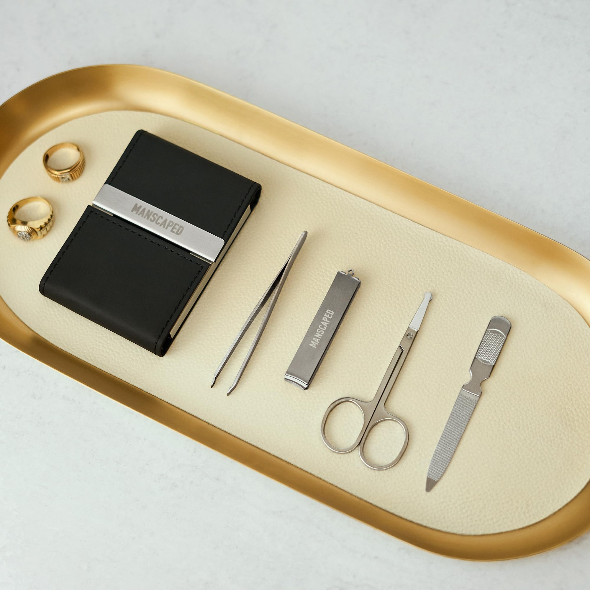 MANSCAPED kit inside a travel bag representing portability and convenience benefit